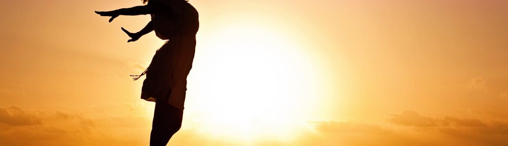 woman-happiness-sunrise-silhouette